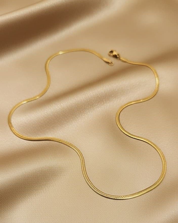 COLAR FITA 3MM AÇO DOURADO